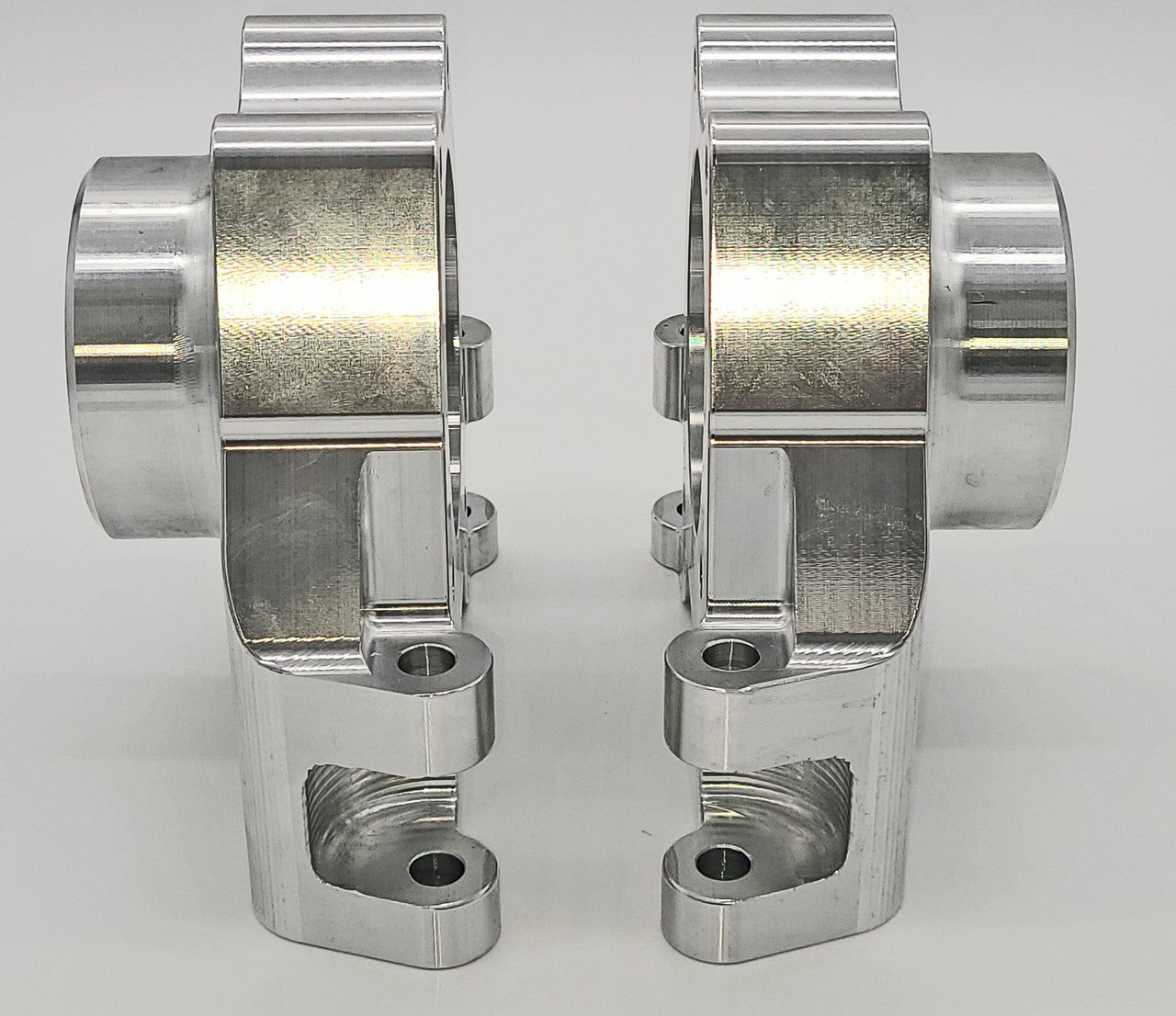 Rear Spindle Bearing Carriers will be hard anodized with a black finish.  These photos in raw billet are to show the detail only.