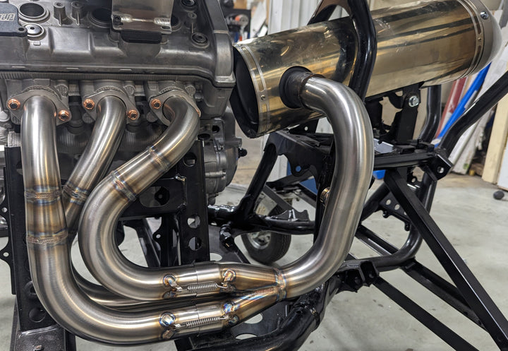 Shown with a stock YXZ Muffler