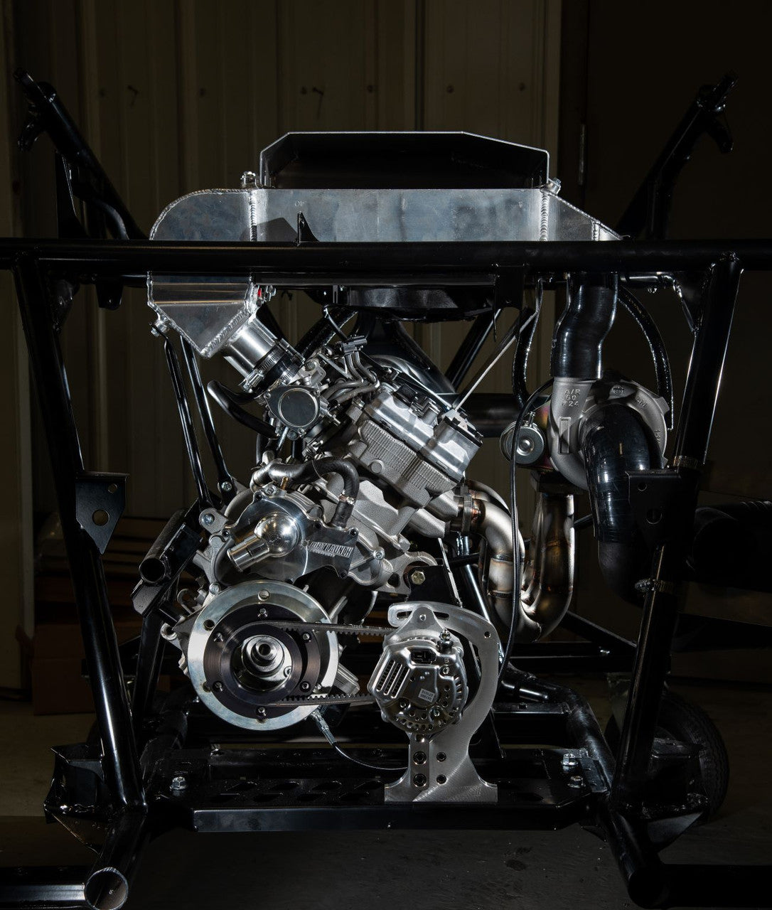 Yamaha YXZ engine with GYTR turbo system upgraded with ECU flash, injectors, and boost control for improved drivability and power.