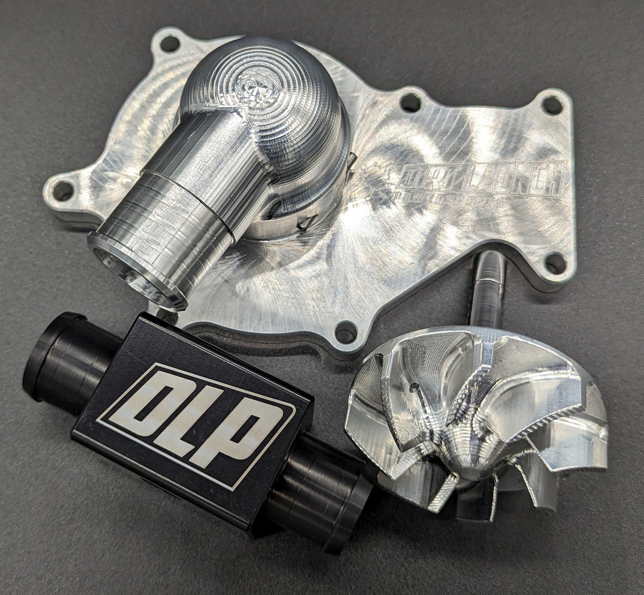 Dirt Launch Powersports YXZ cooling kit components including billet water pump housing thermostat delete and impeller
